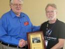 Ward Silver, N0AX (right), receives the Bill Orr Plaque from ARRL Foundation President Tom Frenaye, K1KI. [Norm Fusaro, W3IZ, photo]